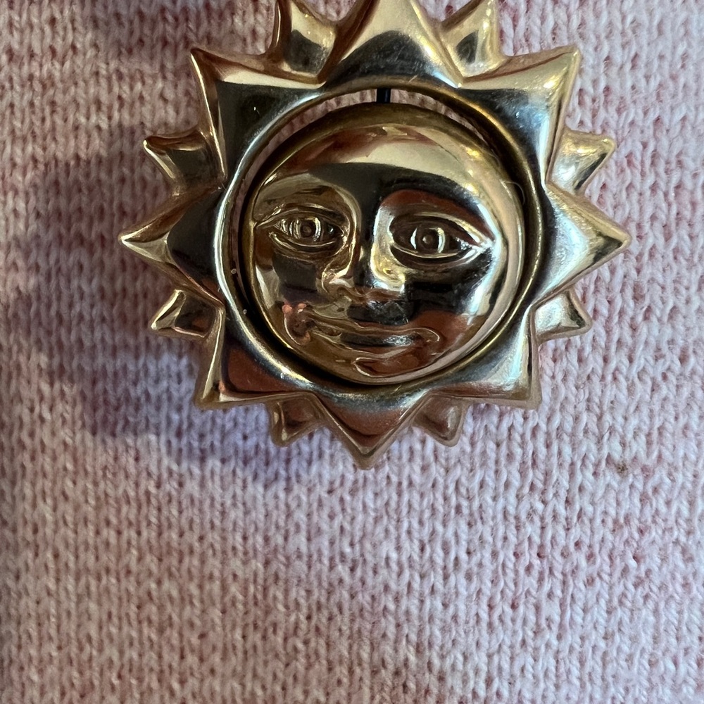 14 karat gold, celestial son pendant it’s hollow